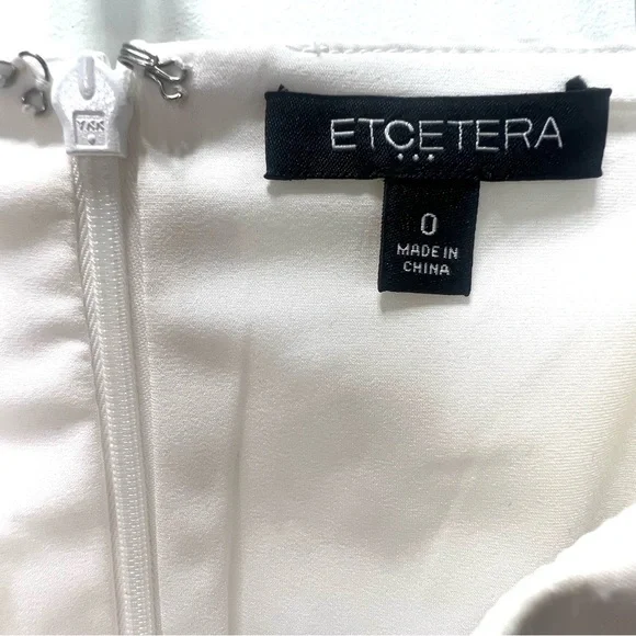 ETCETERA Solid White Pencil Skirt Eyelet Mock Tie Lace Up Detail Size 0 … - Picture 9 of 11